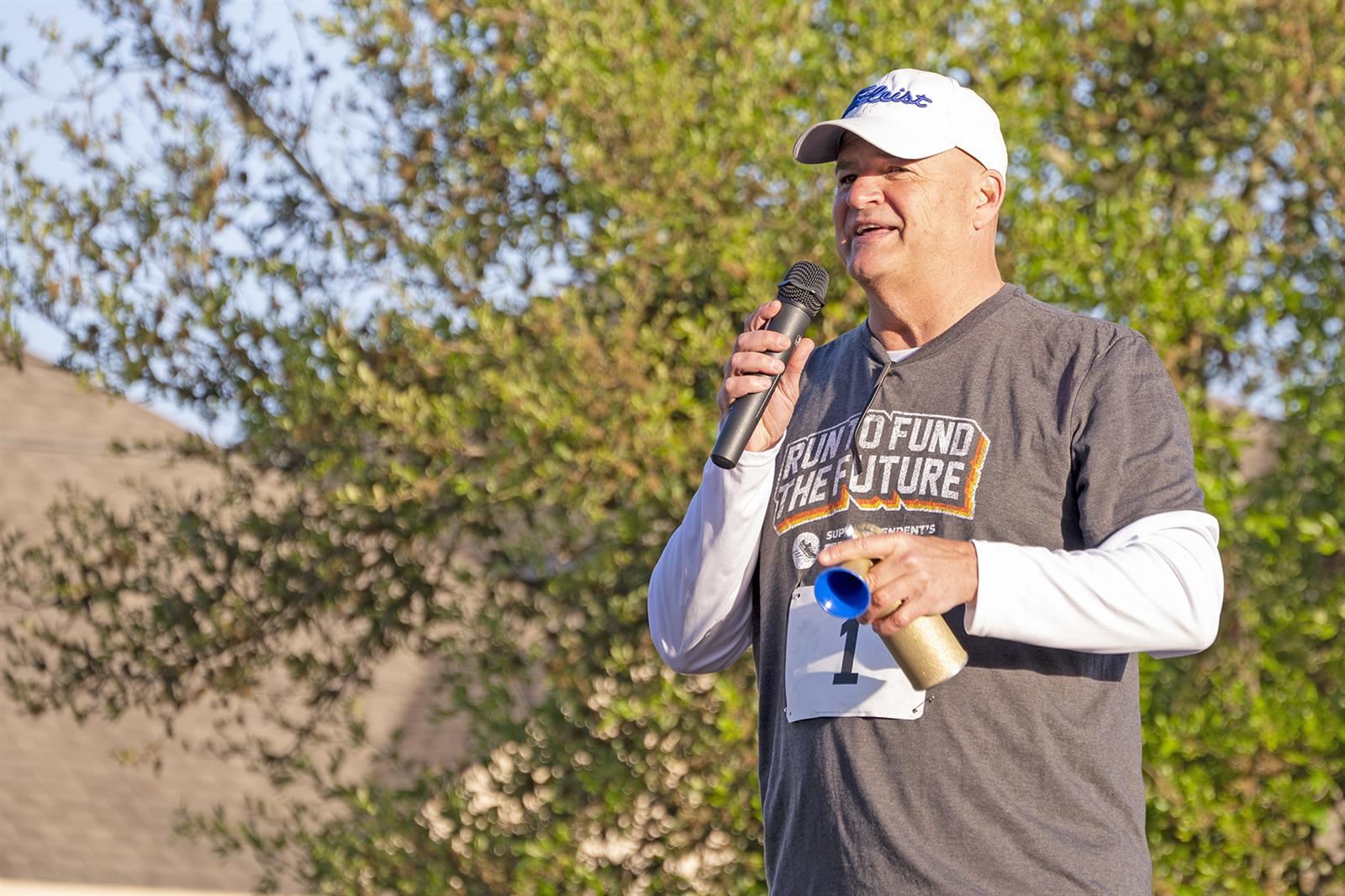 Dr. Mark Henry, CFISD superintendent of schools, starts the 5K at the ninth annual Superintendent’s Fun Run in April 2022.